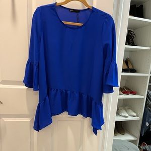 Woman’s blouse NWT color blue size small